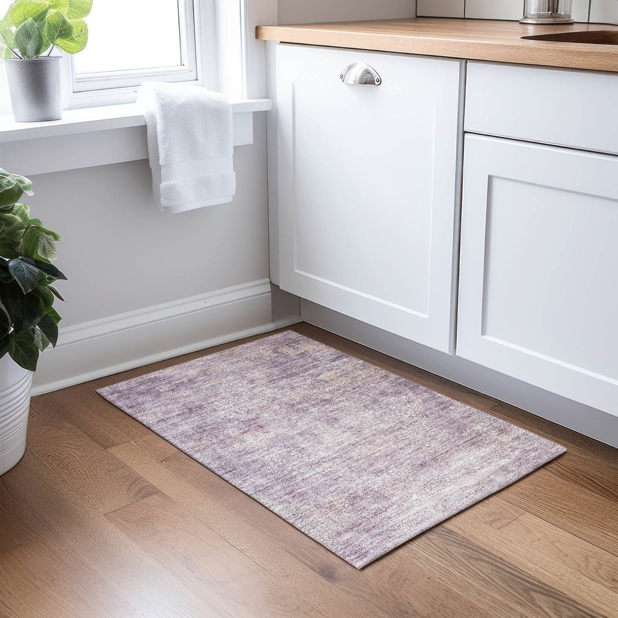 Dalyn Burano BU10 Plum Rug shown in a room