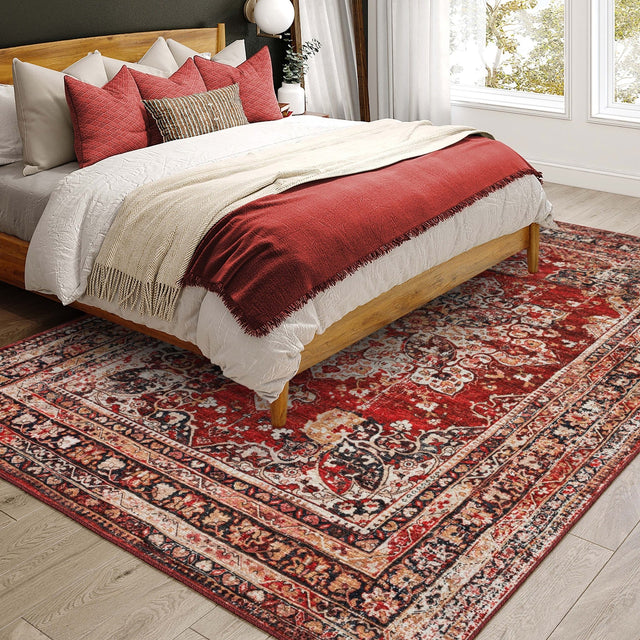 Dalyn Jericho JC6 Garnet Rug shown in a room