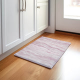 Dalyn Pacifica PA6 Pink Rug shown in a room
