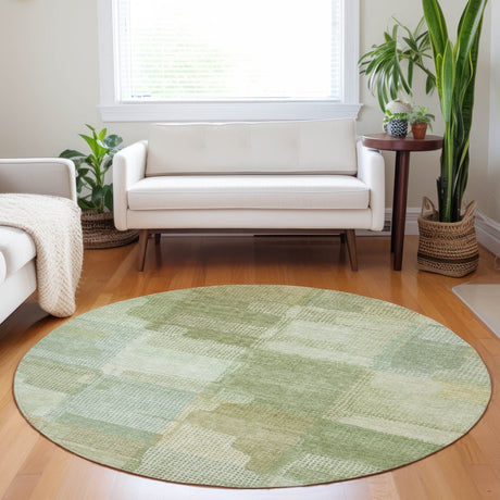 Dalyn Ravenna RN10 Green Rug shown in a room