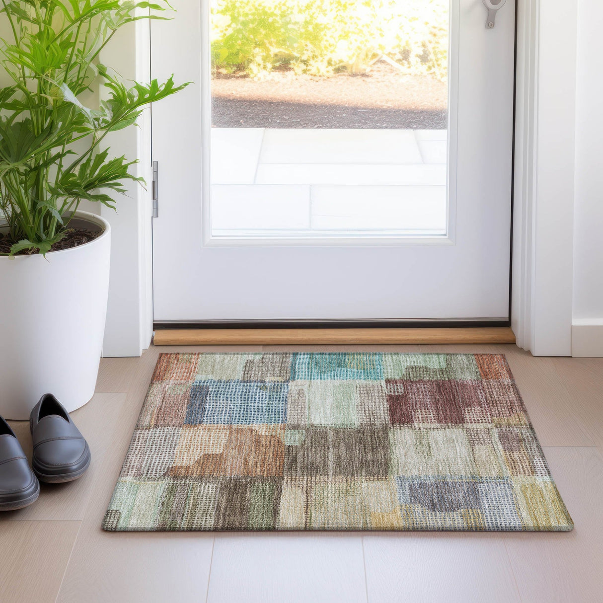 Dalyn Ravenna RN10 Putty Rug shown in a room