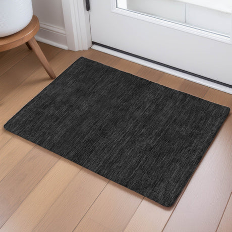 Dalyn Soft Essentials SE6 Black Rug shown in a room