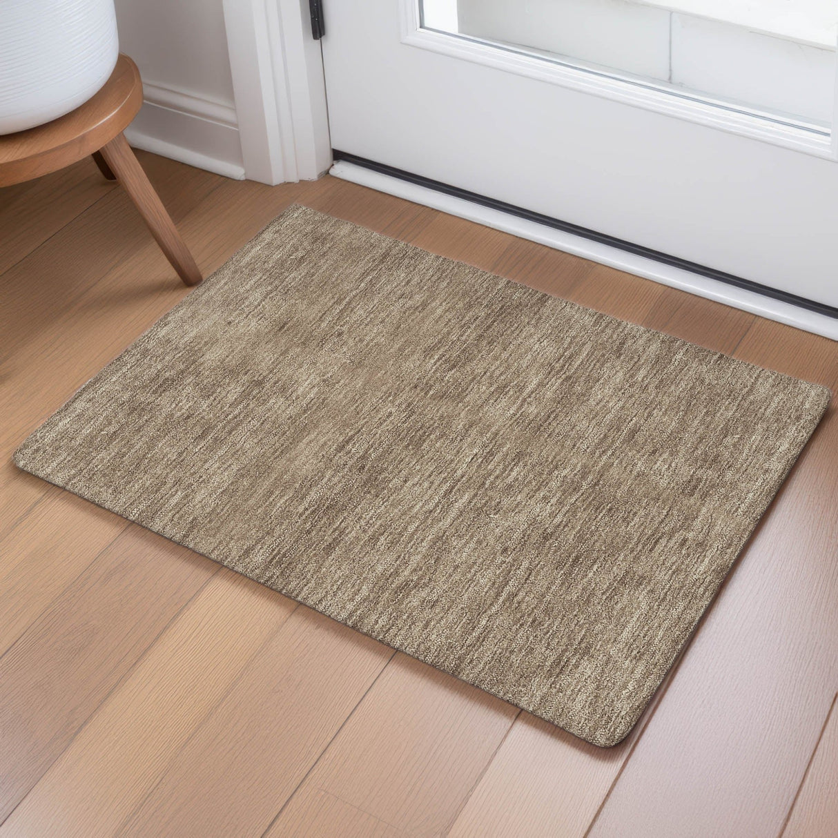 Dalyn Soft Essentials SE6 Mocha Rug shown in a room