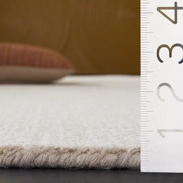 Safavieh Abstract 5'-0" x 8'-0" Rug in Beige / Ivory
