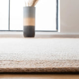 Safavieh Braided 5'-0" x 7'-0" Rug in Beige / Ivory