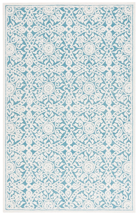 Safavieh Metro 4'-0" x 6'-0" Rug in Teal / Ivory