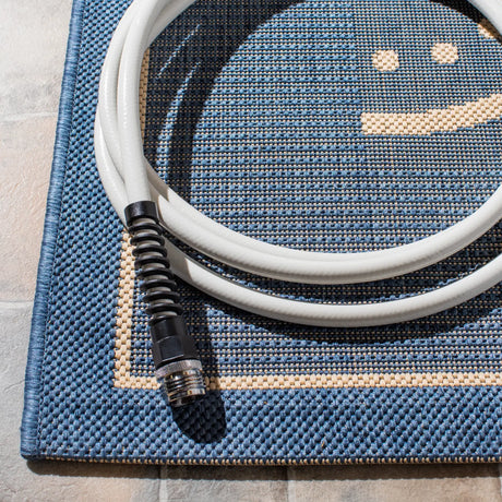 Safavieh Courtyard 6'-7" x 9'-6" Rug in Blue / Natural