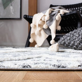 Safavieh Moroccan Tassel Shag 4'-0" x 6'-0" Rug in Grey / Ivory