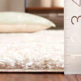 Safavieh Tahoe Shag 4'-0" x 6'-0" Rug in Ivory / Gold