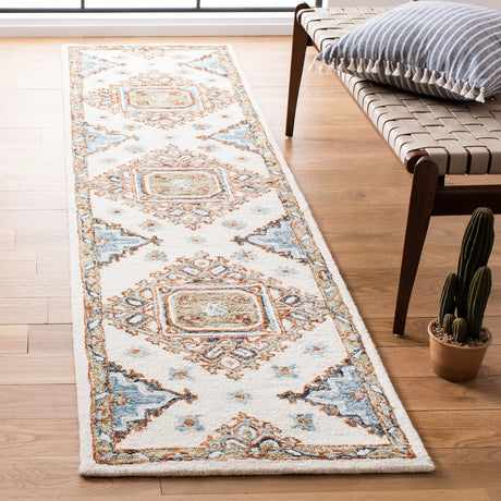 Safavieh Capri 2'-3" x 9'-0" Rug in Ivory / Rust