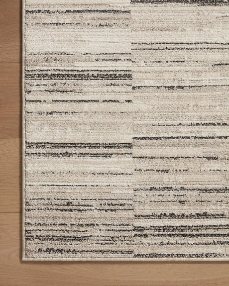 Loloi Darby Dar-01 Charcoal/Sand Rug - corner on wood