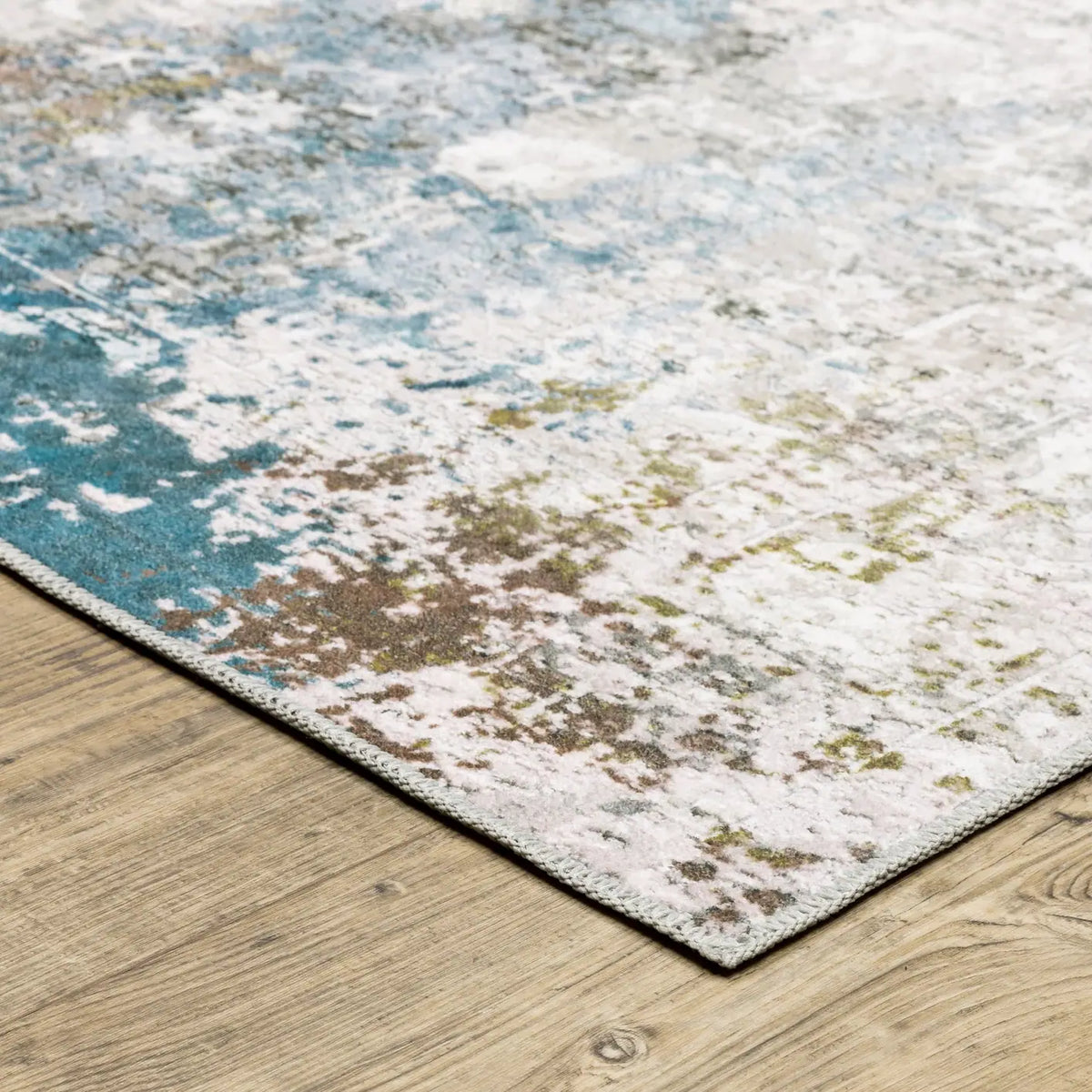 Oriental Weavers Machine Washable Malibu Mal06 Ivory/ Blue Rug - corner detail