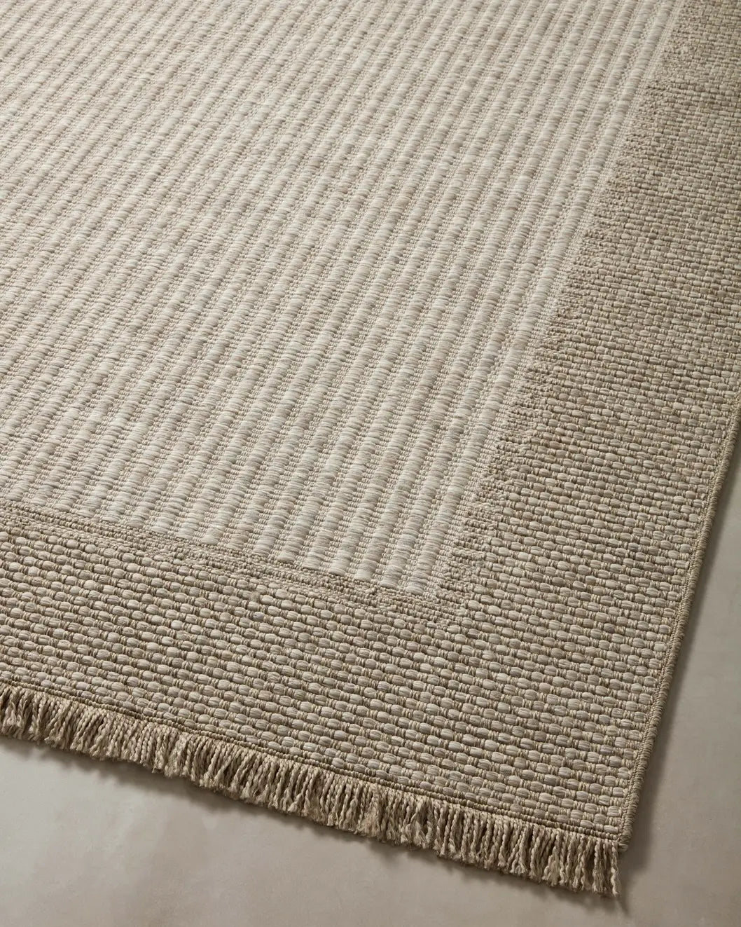 Loloi Dawn Daw-06 Natural Rug - angled corner on wood