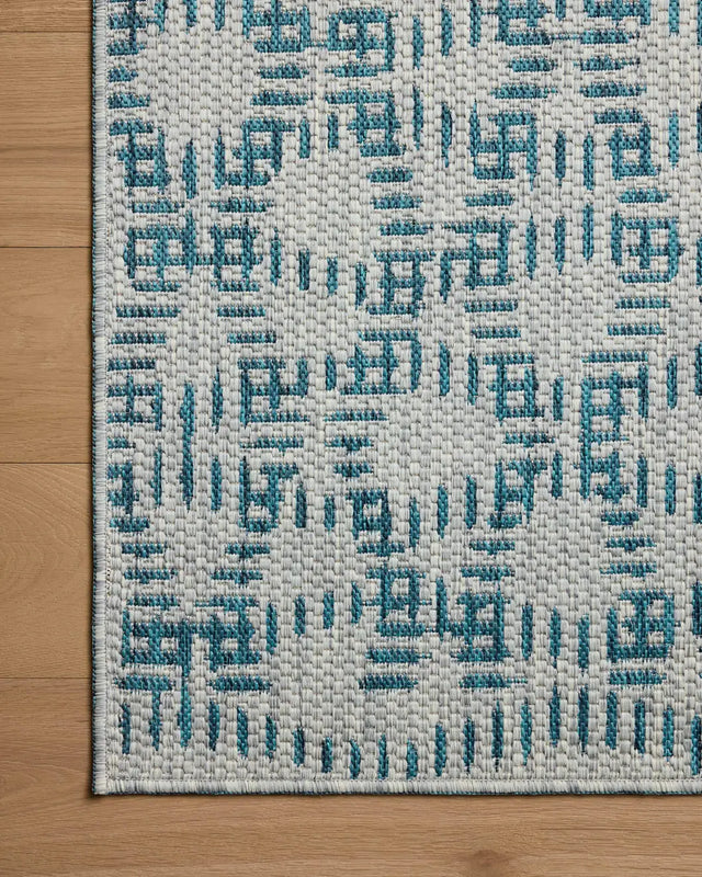 Loloi Easton ESN-10 Fog / Teal Rug - corner on wood