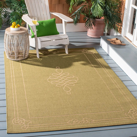 Safavieh Courtyard 4'-0" x 5'-7" Rug in Green / Creme