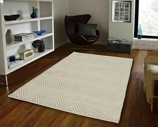 Ivory rectangular modern patterned rug with textured geometric weave