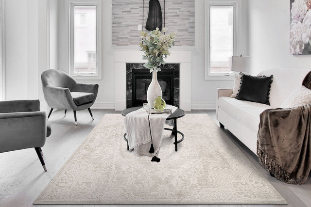 Traditional cream rug with ornate scrolling pattern, rectangular floor rug