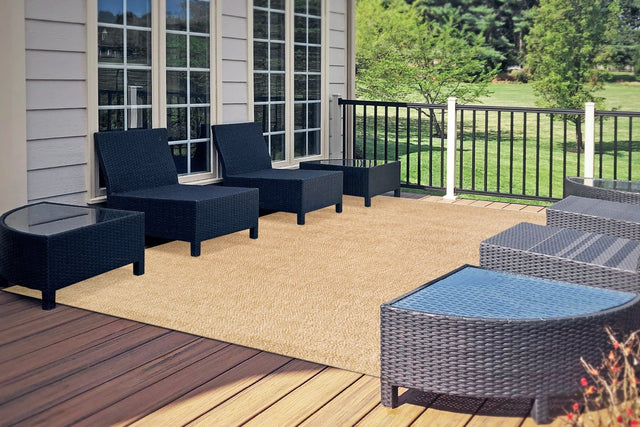 Natural modern area rug in tan with subtle textured pattern, power-loomed.
