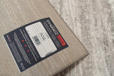 Modern grey textured rug with corner label visible