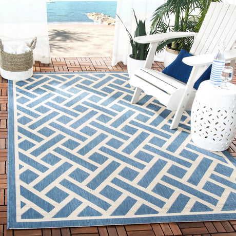 Safavieh Courtyard 5'-3" x 7'-7" Rug in Blue / Light Beige