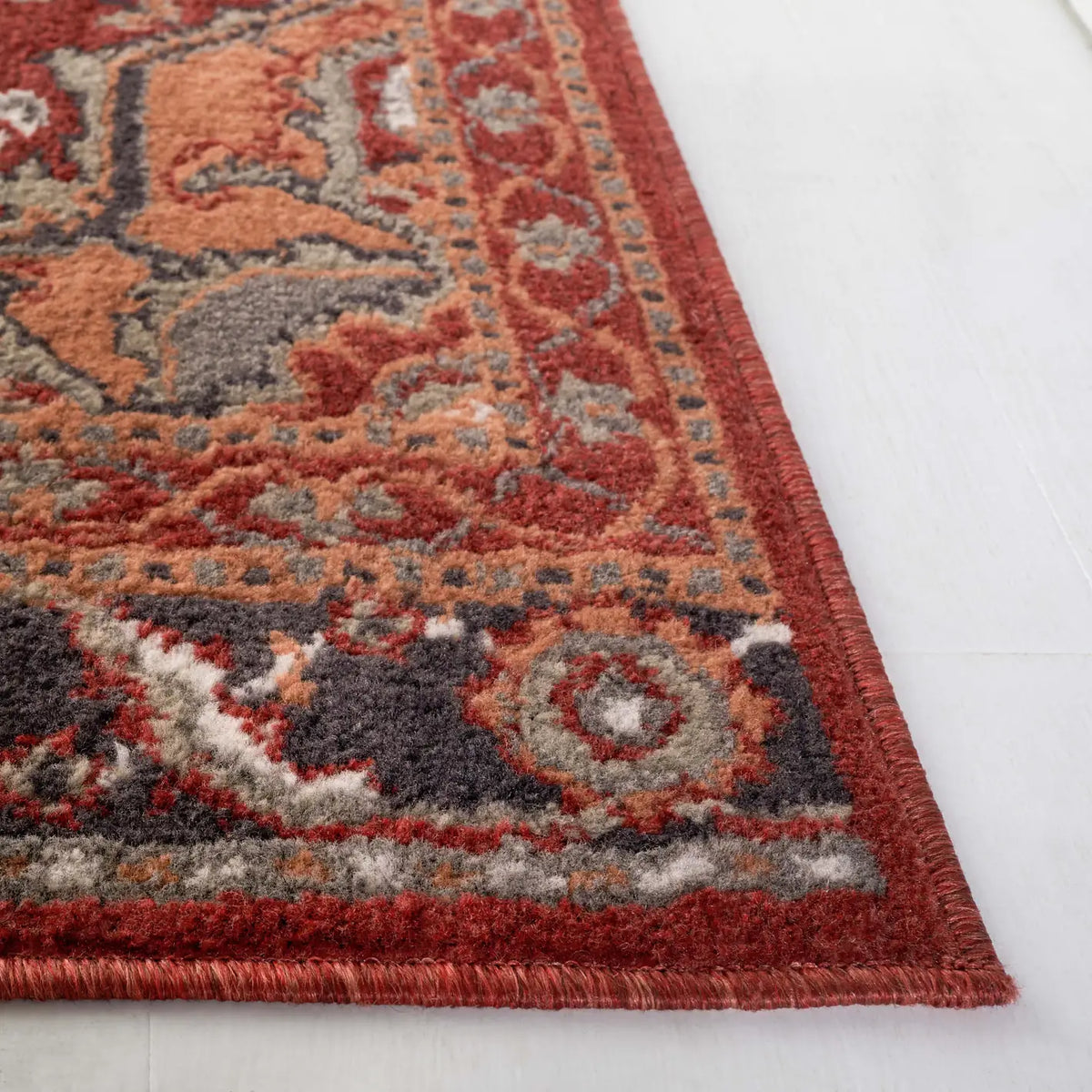 Safavieh Pyramid 4'-5" x 6'-5" Rug in Rust / Ivory Grey