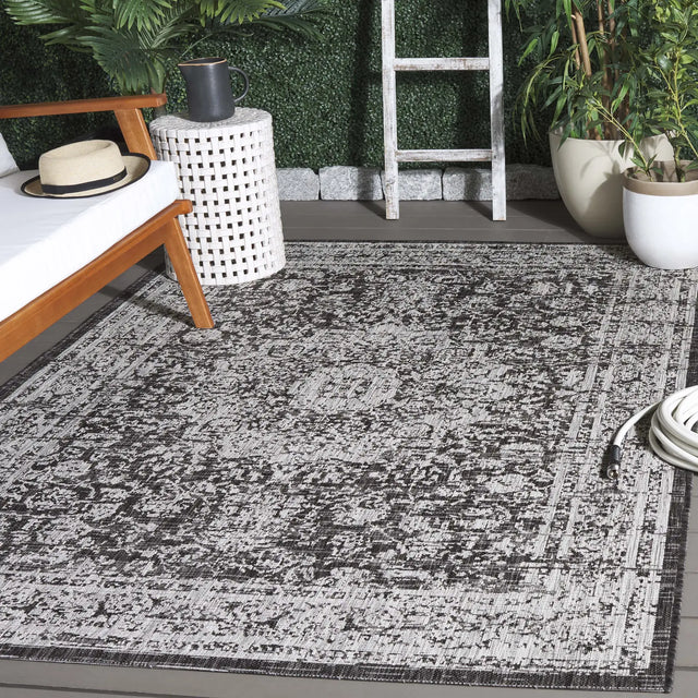 Safavieh Courtyard 5'-3" x 7'-7" Rug in Grey / Black