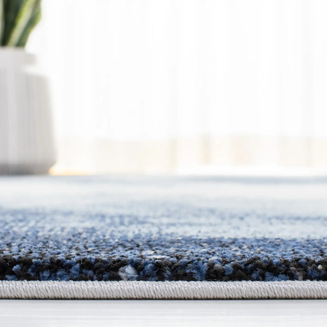 Safavieh Galaxy 4'-0" x 6'-0" Rug in Blue / Ivory