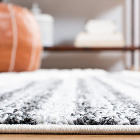 Safavieh Moroccan Tassel Shag 4'-0" x 6'-0" Rug in Dark Grey / Ivory