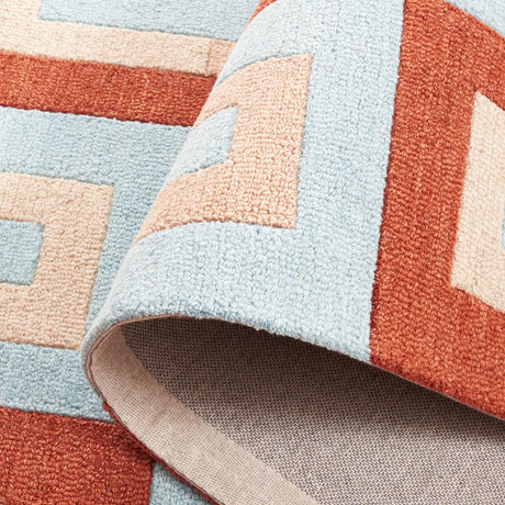 Safavieh Genre 4'-0" x 6'-0" Rug in Light Blue / Rust