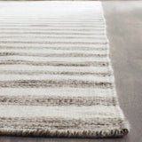 Safavieh Dhurries 6'-0" x 9'-0" Rug in Brown / Ivory