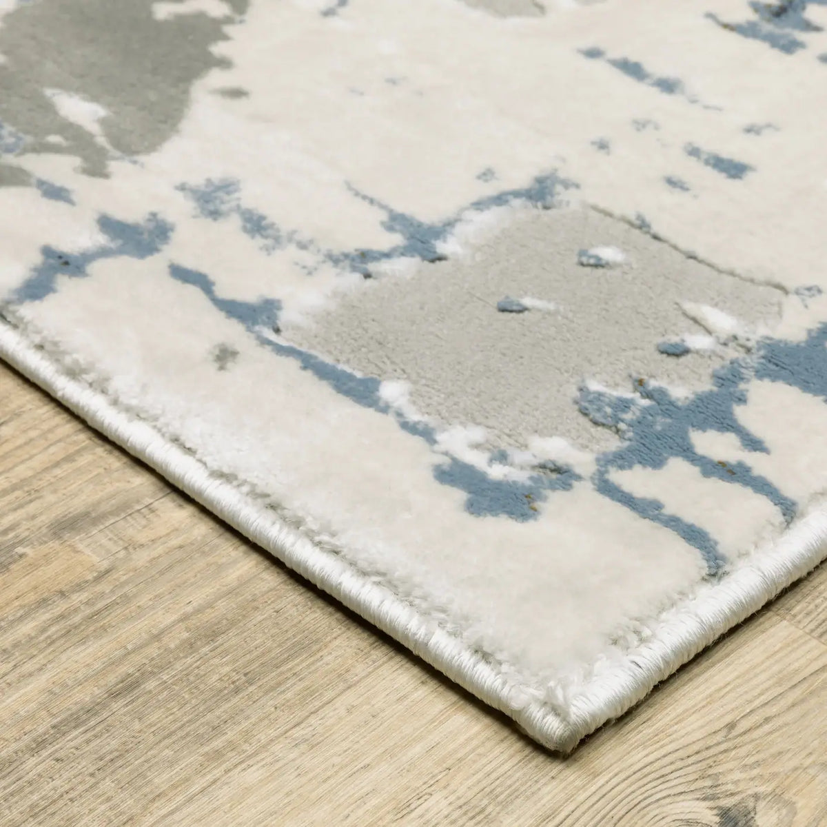 Oriental Weavers Sphinx Easton 8111X Ivory/Blue Rugs - corner detail