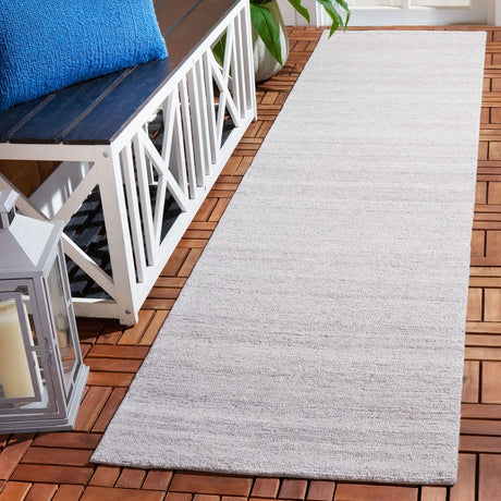 Safavieh Outdoor Micro-Loop 2'-3" x 9'-0" Rug in Beige