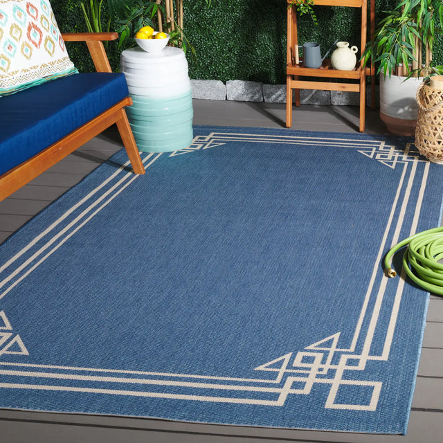 Safavieh Courtyard 5'-3" x 7'-7" Rug in Blue / Light Beige