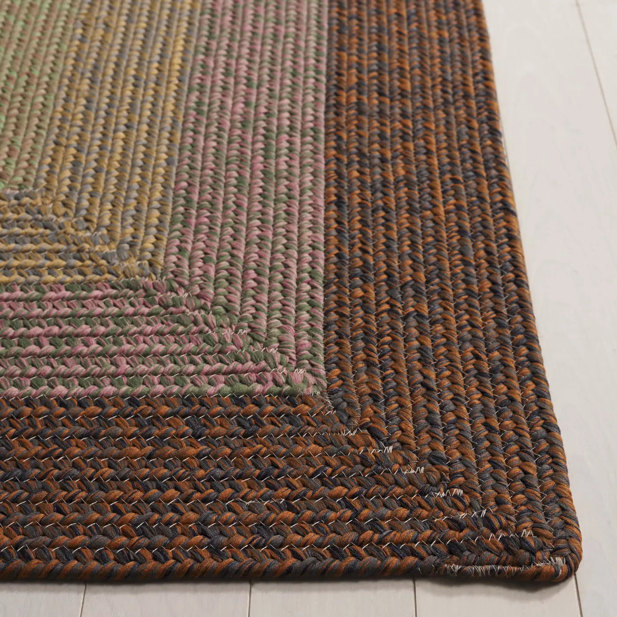 Safavieh Braided 5'-0" x 8'-0" Rug in Dark Brown / Light Green