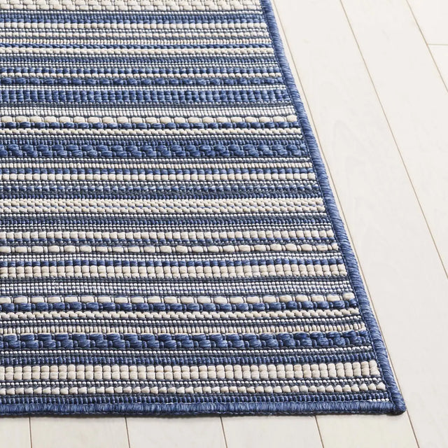 Safavieh Escape 700 5'-3" x 7'-6" Rug in Blue / Beige