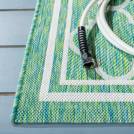 Safavieh Courtyard 4'-0" x 5'-7" Rug in Green / Ivory