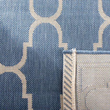 Safavieh Courtyard 5'-3" x 7'-7" Rug in Blue / Beige