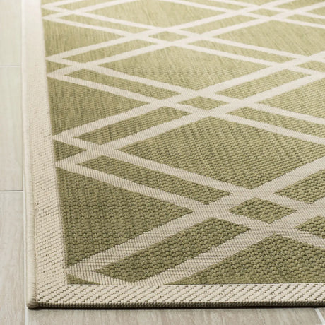 Safavieh Courtyard 4'-0" x 5'-7" Rug in Green / Beige