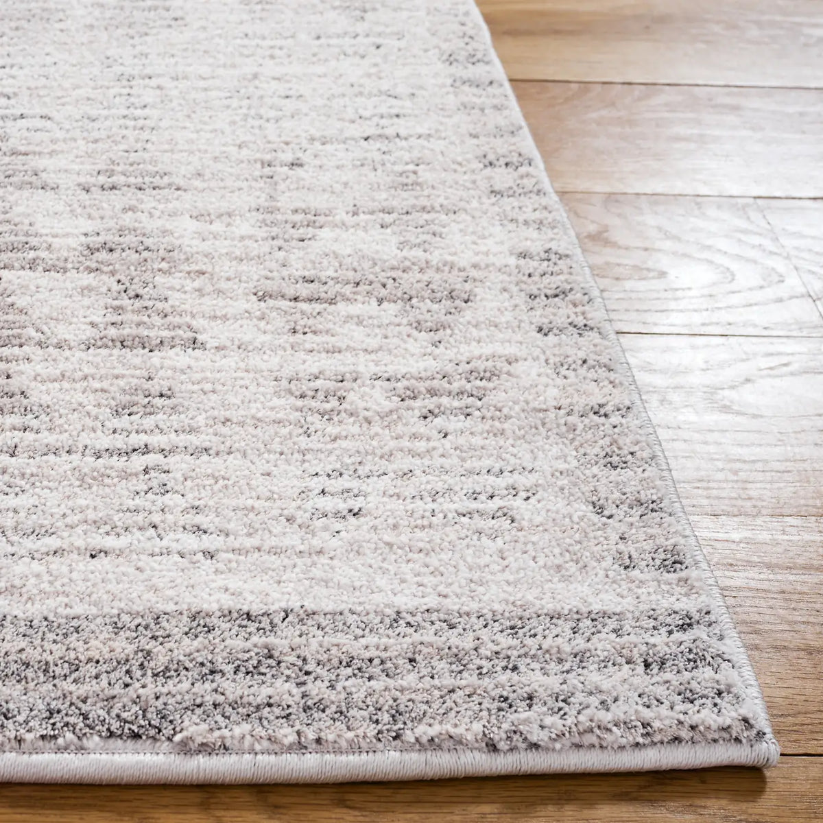 Safavieh Northport 6'-7" x 9'-6" Rug in Ivory / Dark Grey