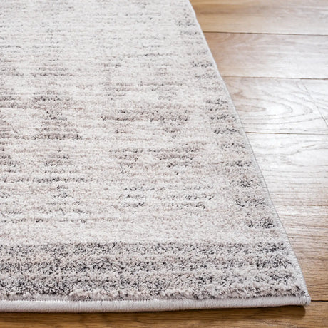Safavieh Northport 6'-7" x 9'-6" Rug in Ivory / Dark Grey