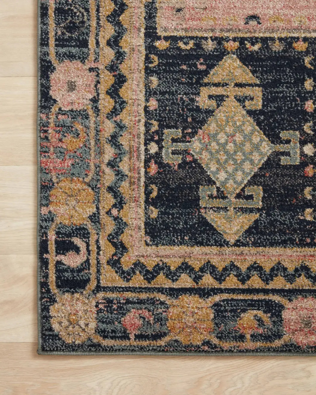 Loloi Jocelyn Joc-06 Rose/Rose Rugs - corner on wood