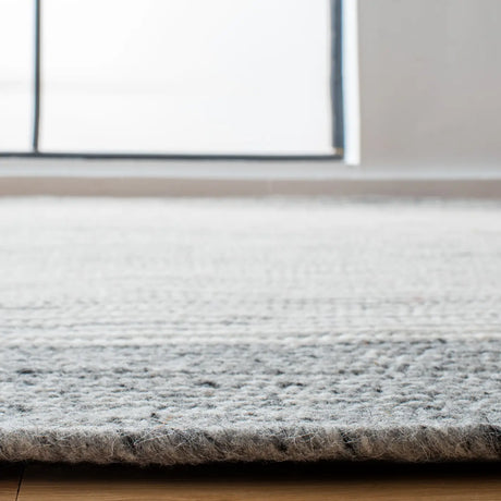 Safavieh Braided 5'-0" x 7'-0" Rug in Grey / Ivory