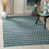 Safavieh Montauk 4'-0" x 6'-0" Rug in Turquoise / Blue/Black