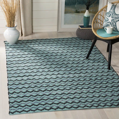 Safavieh Montauk 4'-0" x 6'-0" Rug in Turquoise / Blue/Black