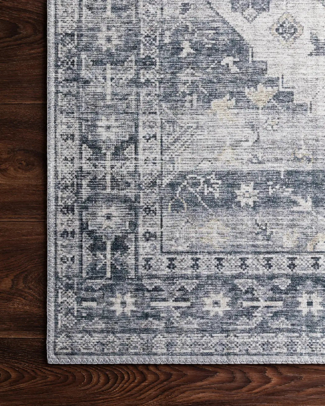 Loloi Skye Sky-02 Silver/Grey Rugs - corner on wood