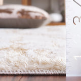 Safavieh Ravine Shag 4'-0" x 6'-0" Rug in Beige / Ivory