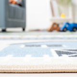 Safavieh Kids Playhouse 200 4'-4" x 6'-0" Rug in Beige / Green