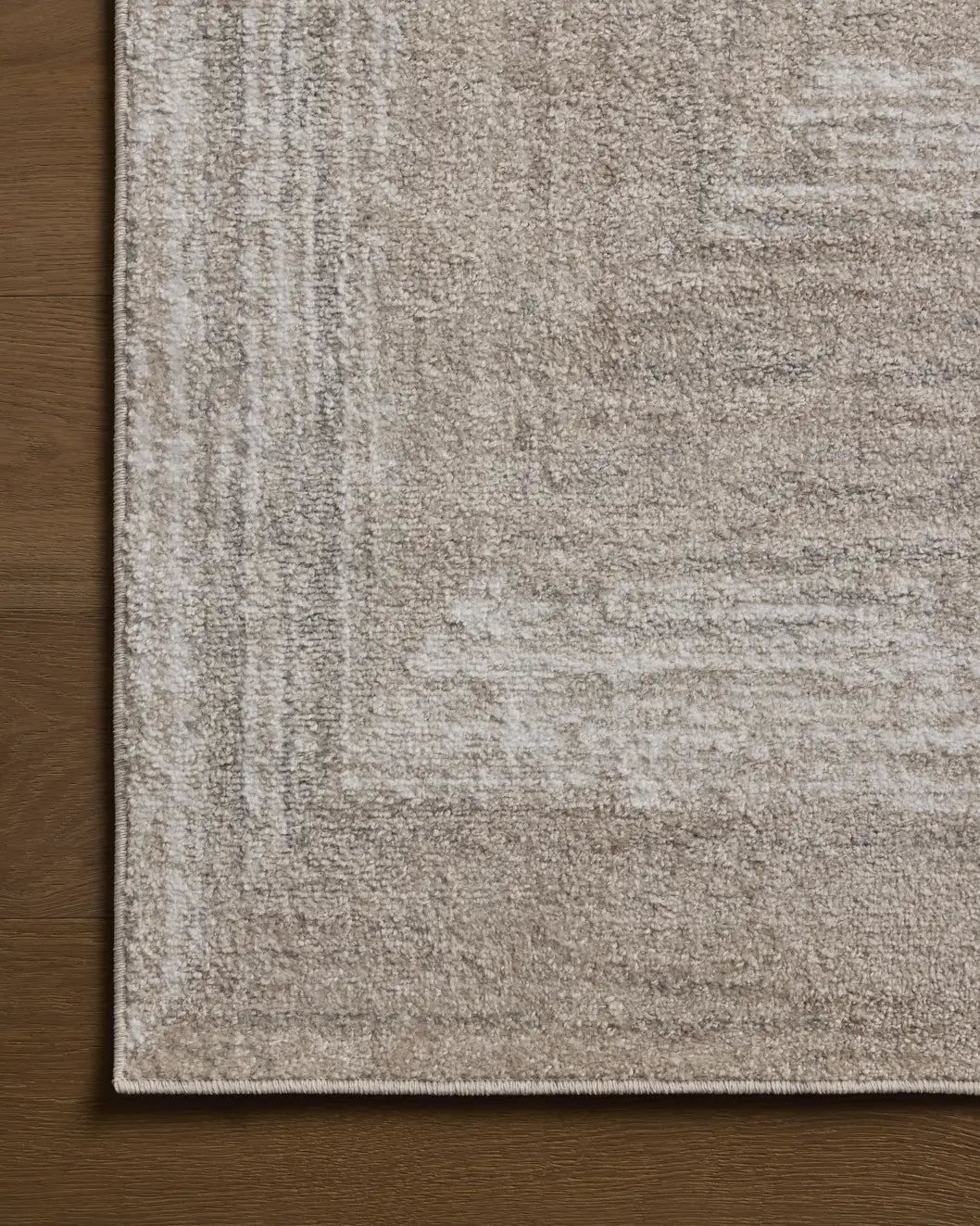 Loloi Lune LUN-01 Natural / Stone Rug - corner on wood