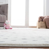 Safavieh Carousel Kids 100 4'-0" x 6'-0" Rug in Ivory Grey / Pink