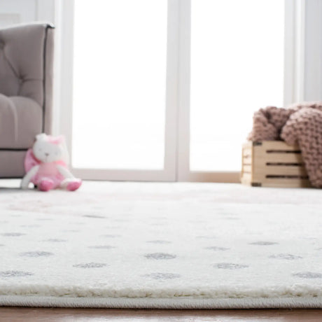 Safavieh Carousel Kids 100 4'-0" x 6'-0" Rug in Ivory Grey / Pink